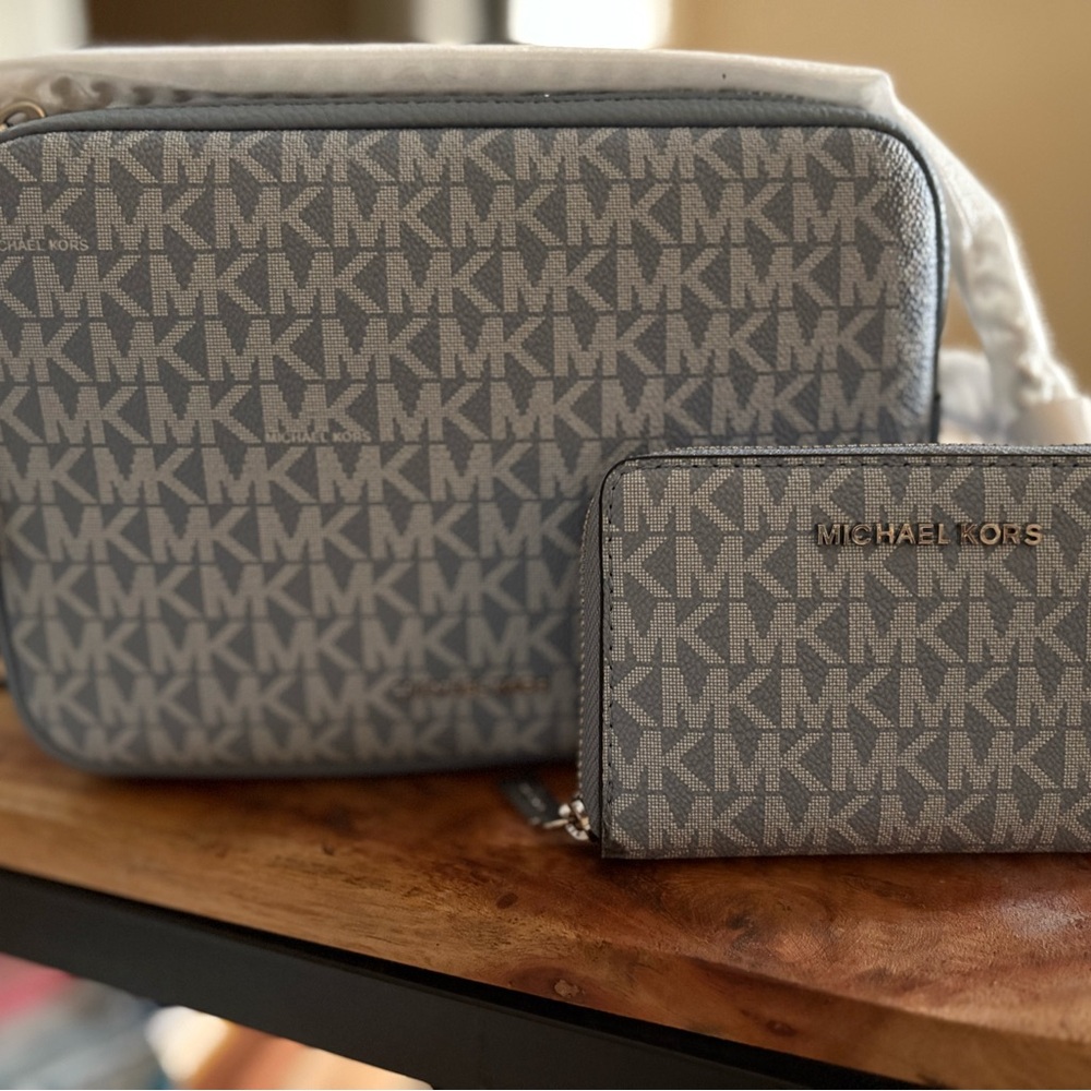 Michael Kors Women's light blue monogram crossbody and wallet set